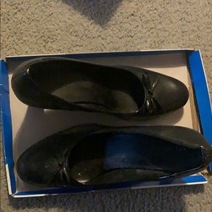 Black heels with bow on front